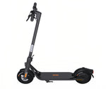 A full side view of the Segway F2 electric KickScooter, showcasing its sleek black frame, orange accents, and integrated safety reflectors.