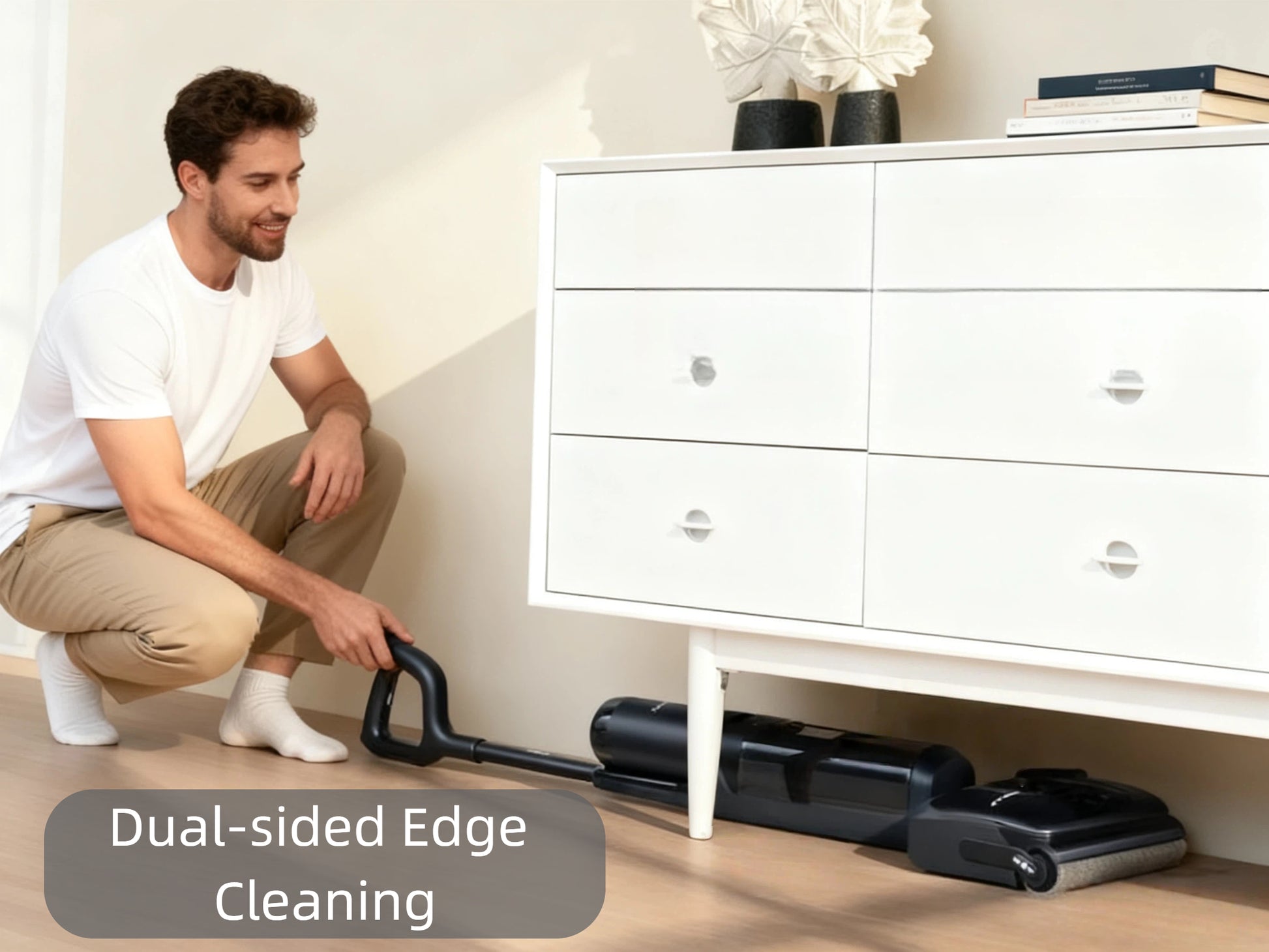 A man easily cleans right up to the baseboards using the Tineco FLOOR ONE S7 Stretch, demonstrating its effective dual-sided edge cleaning feature for a complete clean in any room.
