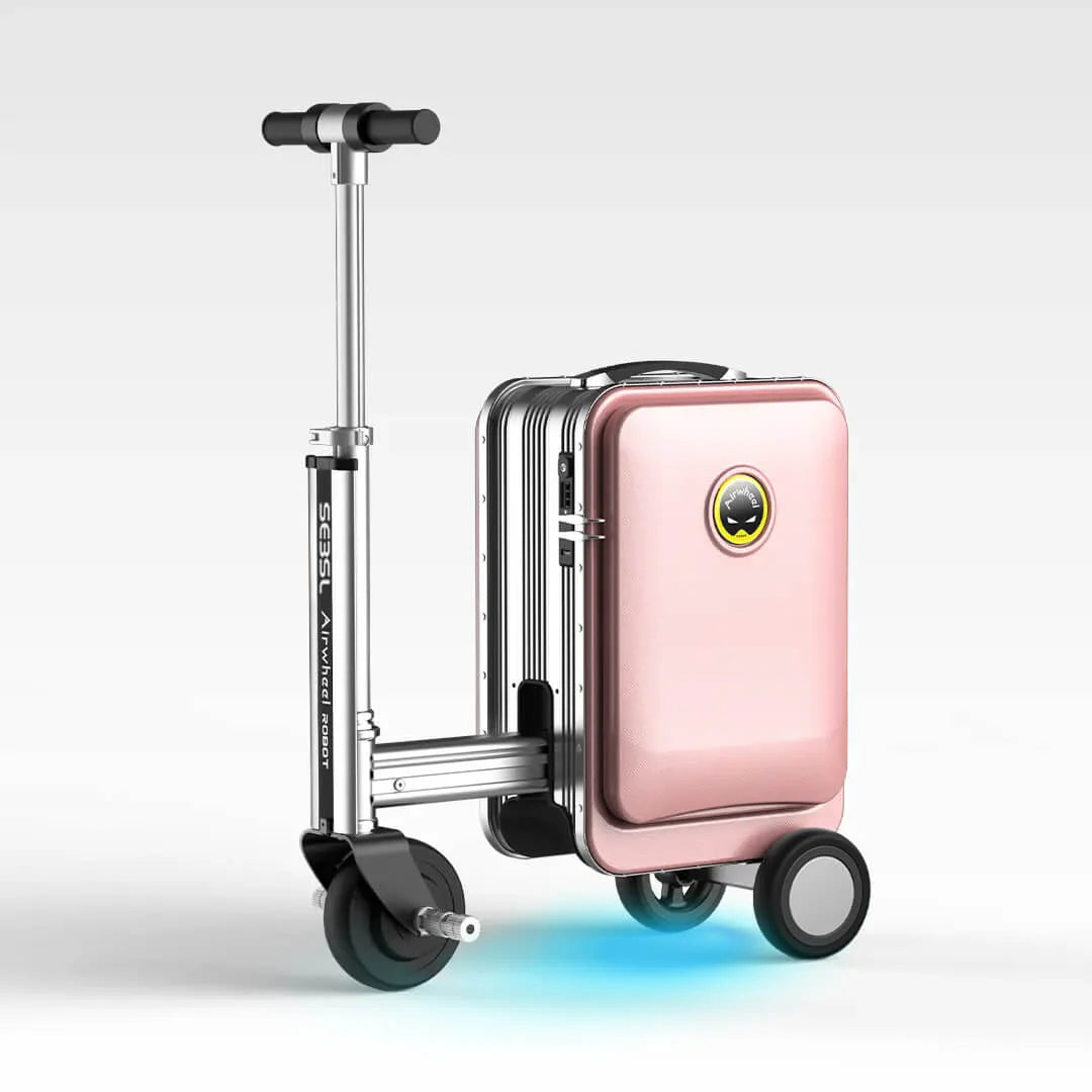 The stylish pink Airwheel SE3SL scooter suitcase unfolded and ready to ride, displaying its elegant color, extended steering column, and bright blue LED light.