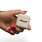 Marshall Minor IV charging case open showing earbuds and Marshall branding