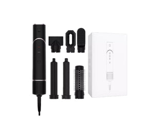 Black 6-in-1 Ultra Styler hair tool shown with full set of attachments including concentrator, diffuser, brush, curling rod, and straightener. Ideal for fast, professional-looking hairstyles.