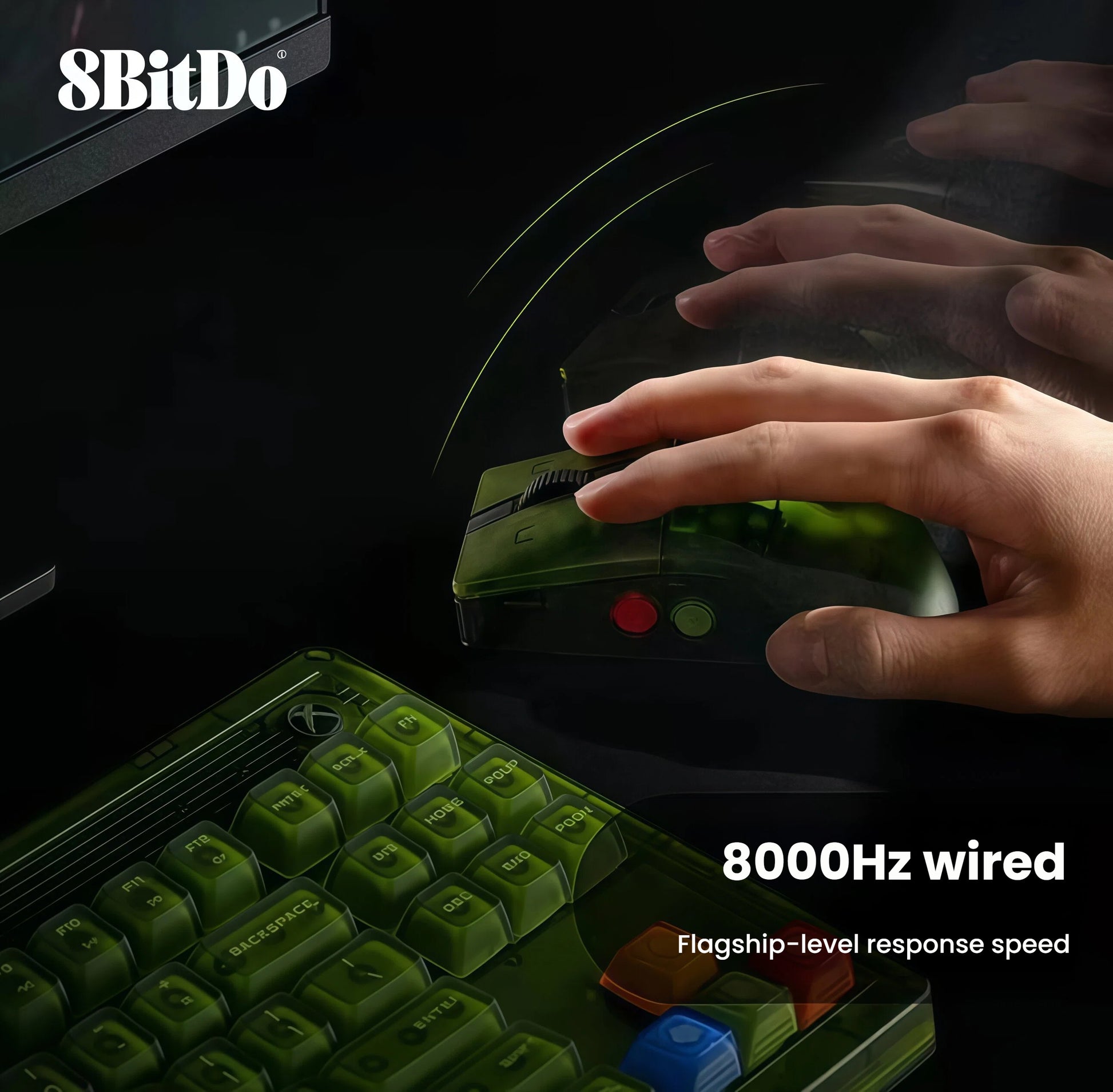 A hand using the 8BitDo Retro R8 Mouse on a dark desk, paired with a matching green mechanical keyboard. The mouse delivers an ultra-fast 8000Hz wired polling rate, ensuring zero input lag and flagship-level responsiveness for competitive gaming.