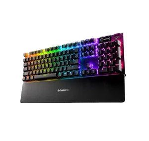 Side view of the SteelSeries Apex 5 mechanical gaming keyboard showcasing its sleek black chassis, full RGB illumination, and compact profile with integrated wrist rest. Perfect for immersive gaming setups.