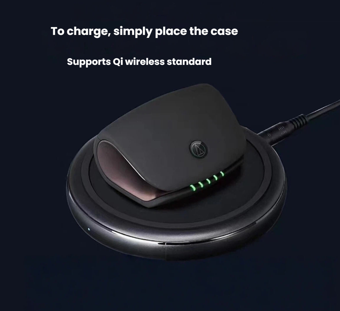Audio-Technica ATH-TWX9 charging case placed on a Qi wireless charger — supports fast and convenient wireless charging for seamless power management.