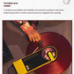 Hand placing yellow Audio-Technica Sound Burger on red vinyl, demonstrating spring-balanced tonearm for stable playback.