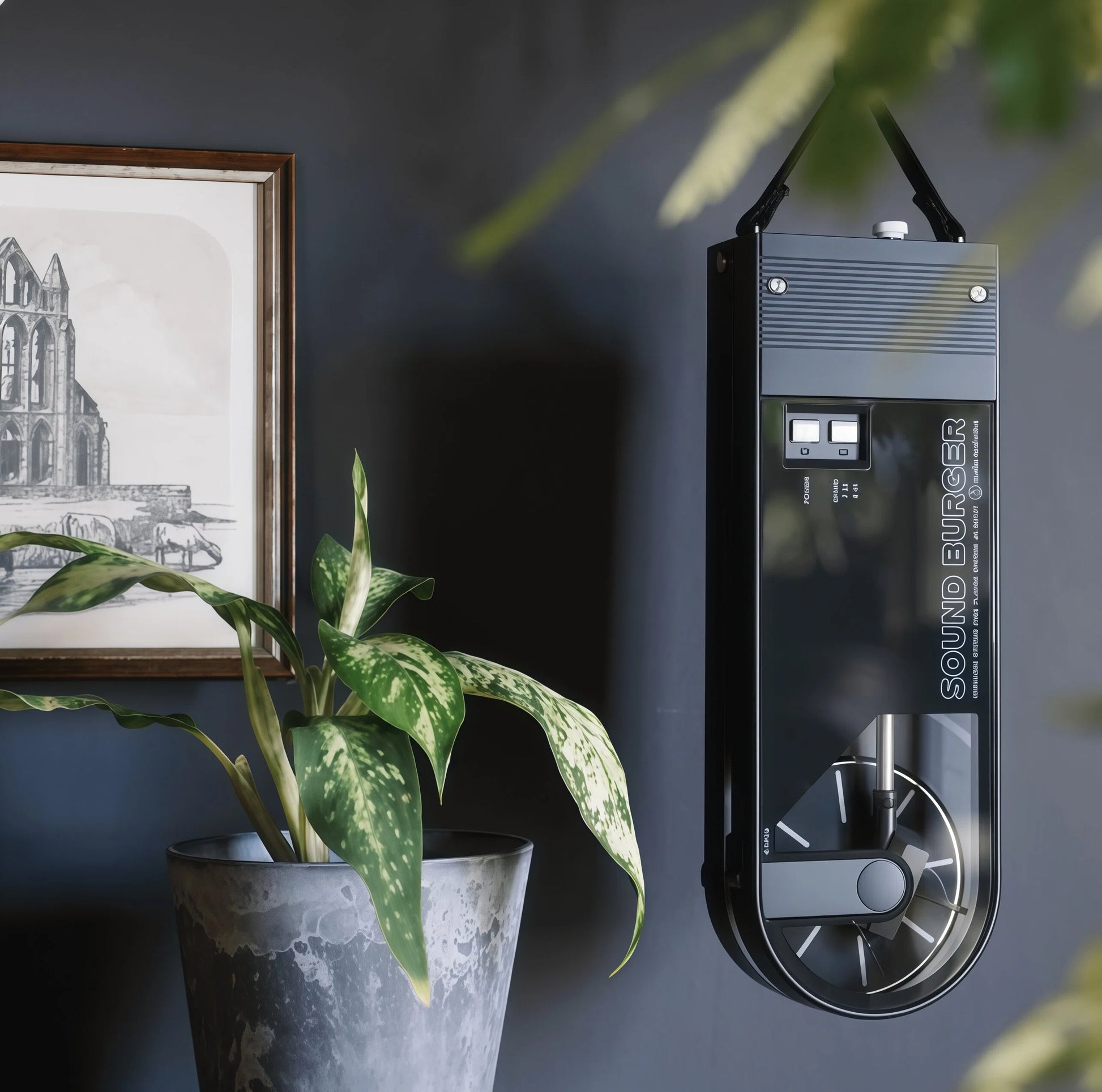 Black Audio-Technica Sound Burger turntable hanging on wall, showcasing space-saving vertical storage option.