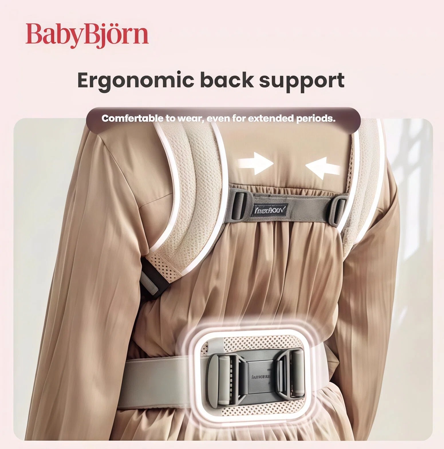 Back view of BabyBjörn Carrier One Cotton showing padded shoulder straps and lumbar support system for comfortable, long-term wear by parents.