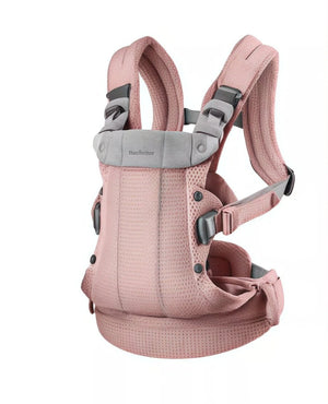 Front view of BabyBjörn Harmony Carrier Mesh in soft rose pink – lightweight, breathable baby carrier with ergonomic design and adjustable straps
