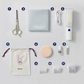Full set of Babycare baby hair clipper accessories: 3 guide combs, safety scissors, cleaning brush, oil, USB cable, storage bag, and main trimmer unit