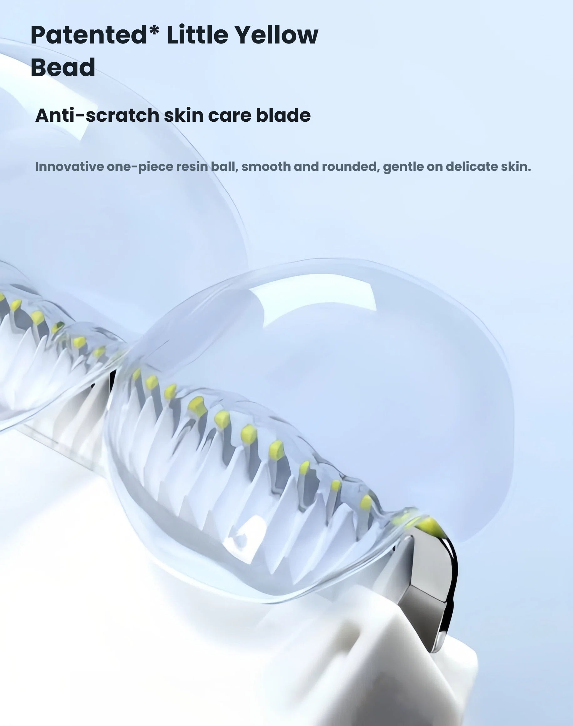Close-up of Babycare baby hair clipper’s patented one-piece resin ball (little yellow bead), smooth and rounded to prevent scratching delicate baby skin
