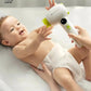 Baby reaching out to touch Babycare cordless hair dryer during use, 37.8°C constant temperature safely protects delicate infant skin from burns