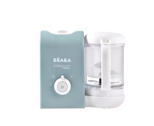 Beaba Babycook Express baby food maker in mint green color, featuring a sleek design and one-button control—ideal for quick steam cooking and blending homemade baby purees safely at home.
