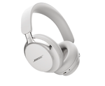 A pair of Bose QuietComfort Ultra Noise Cancelling Headphones in the White Smoke color, angled to showcase their sleek over-ear design, premium materials, and metallic accents on a white background