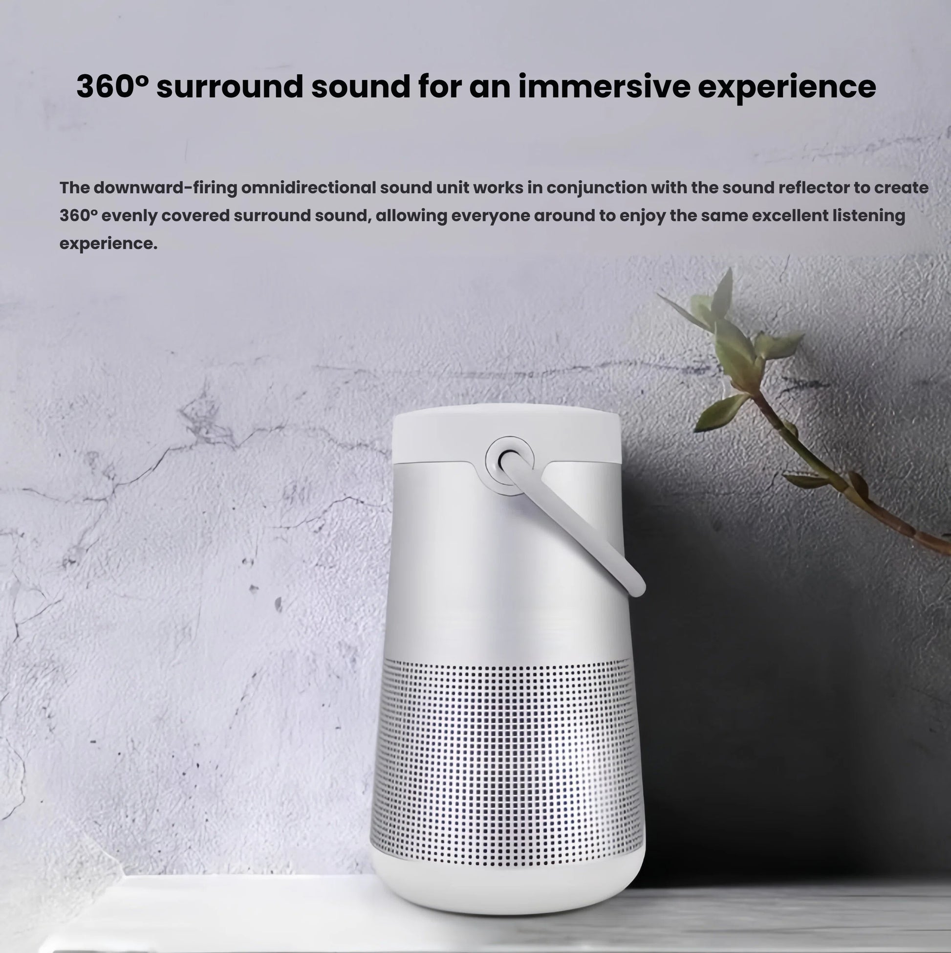 The silver Bose SoundLink Revolve+ II speaker in a stylish home setting, illustrating how its omnidirectional sound unit creates an immersive 360-degree listening experience for everyone in the room.