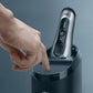 Braun Series 8 shaver being placed on its charging stand, demonstrating the charging process.