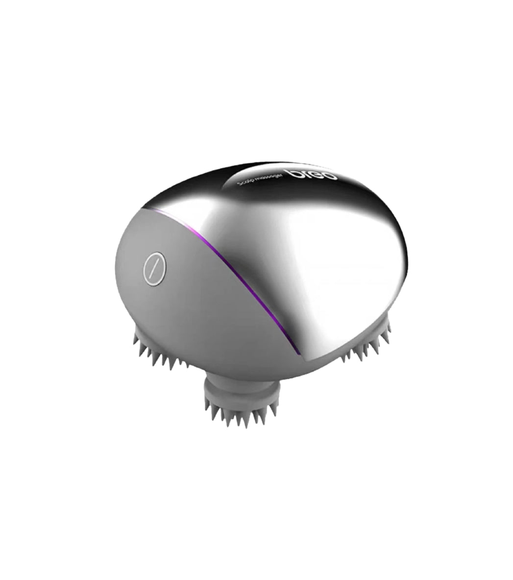Front view of the Breo Scalp Mini waterproof scalp massager in black and silver. The compact, ergonomic design features a single power button and soft silicone nodes for gentle scalp stimulation.