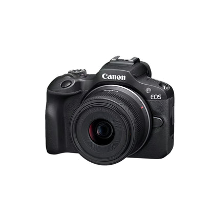 Front view of the Canon EOS R100 mirrorless camera in black, fitted with the RF-S 18-45 mm f/4.5-6.3 IS STM kit lens, showing the compact DSLR-style grip and Canon branding.
