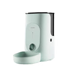 Side view of sleek mint-green DOGNESS Rover APP feeder showing Wi-Fi indicator, feed button, and ceramic dish.