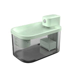 Front view of DOGNESS D13 automatic water fountain in mint green color, featuring transparent water tank, built-in filter, and sleek minimalist design for cats and dogs