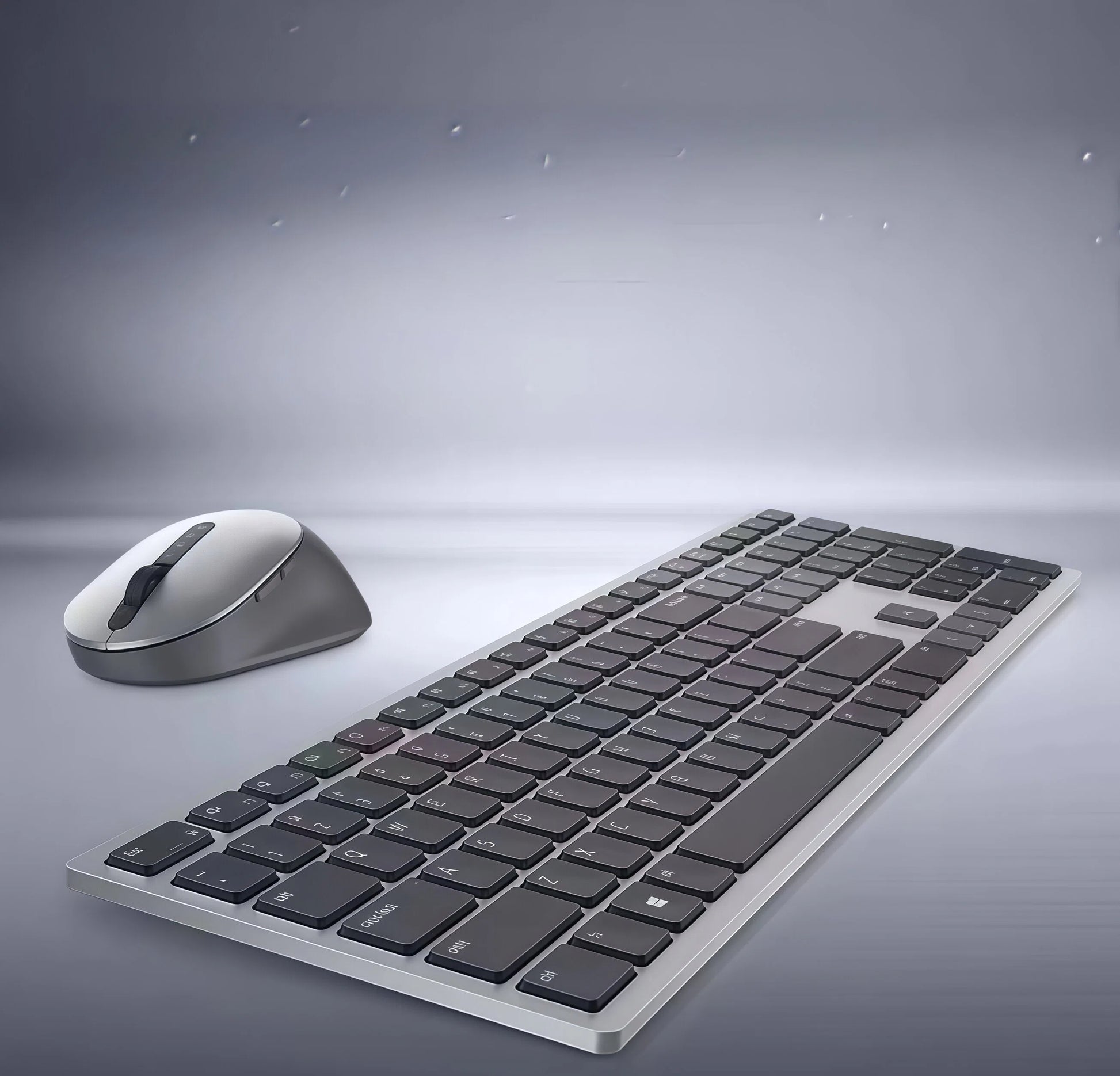 Elegant shot of the Dell KM7120W wireless keyboard and mouse set on a gradient gray background. The premium build quality, ergonomic shape, and seamless connectivity make this set perfect for both home and corporate environments.
