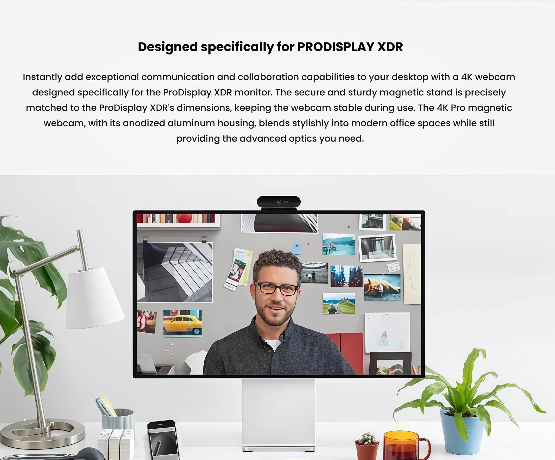  Lifestyle shot of the 4K Pro Magnetic Webcam mounted atop an Apple ProDisplay XDR during a video call, showcasing its seamless integration and professional image quality.