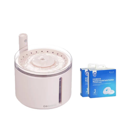Dogness portable pet water dispenser in soft pink color with clear water level window and filter cartridge, shown with two boxes of replacement filters for easy maintenance
