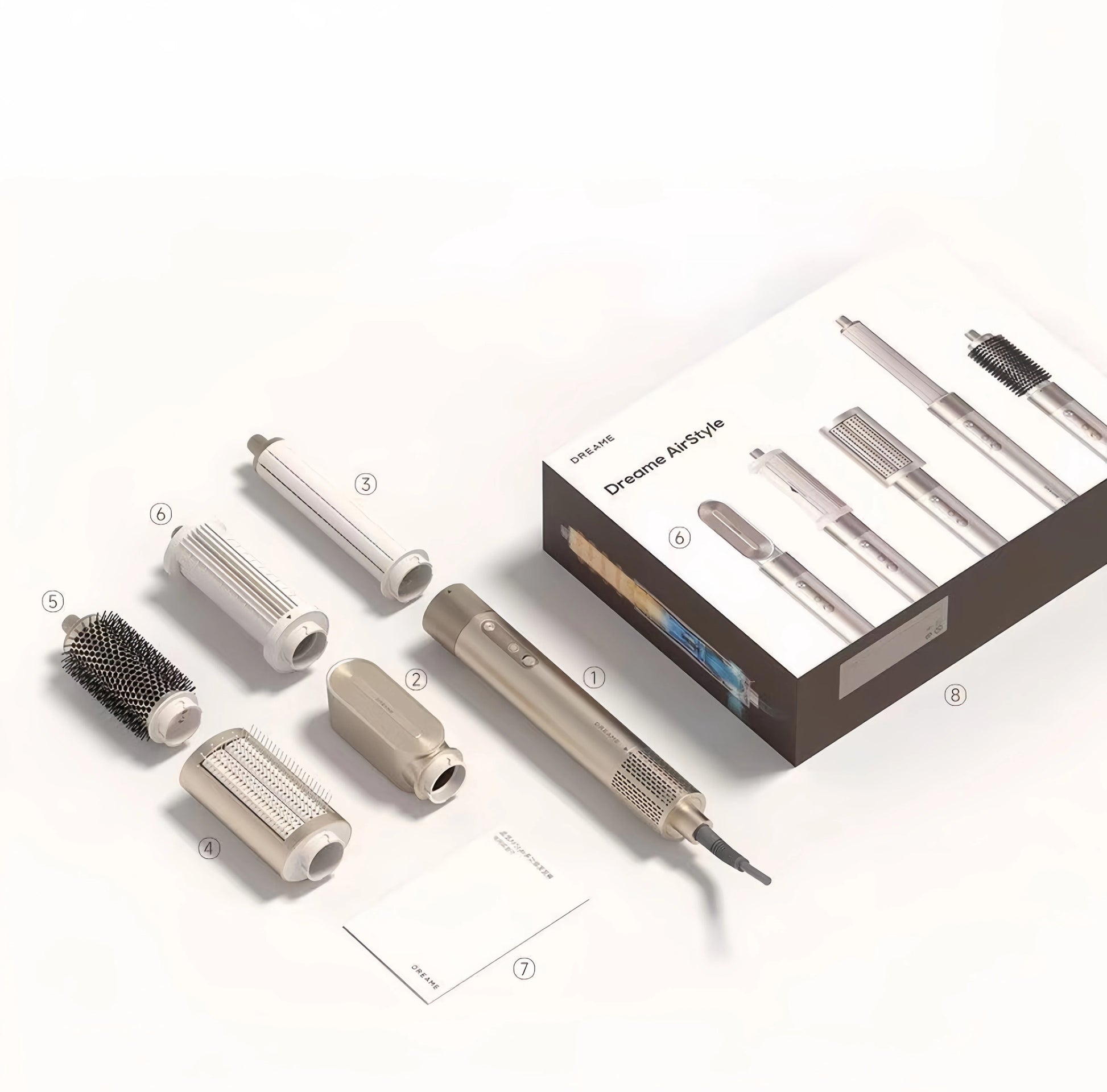 Unboxing shot of Dreame AirStyle 6-in-1 hair styling tool with all accessories laid out: main body, 5 attachments (including round brush, diffuser, concentrator), instruction manual, and original packaging box.