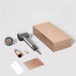 The complete Dreame Hair Glory Mix set unboxed, showing the space grey hair dryer, a magnetic styling nozzle, a hair essence bottle, and its sleek, minimalist packaging