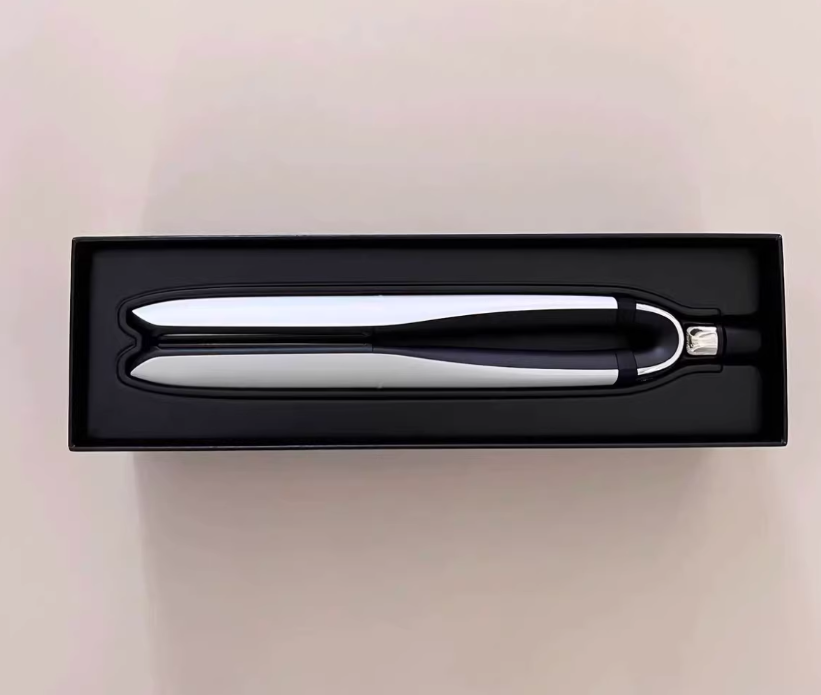 Woman using Dyson Airwrap with Bluetooth app control. Phone displays temperature and time settings for one-click styling. Enables effortless, customizable heat treatment for perfect curls.