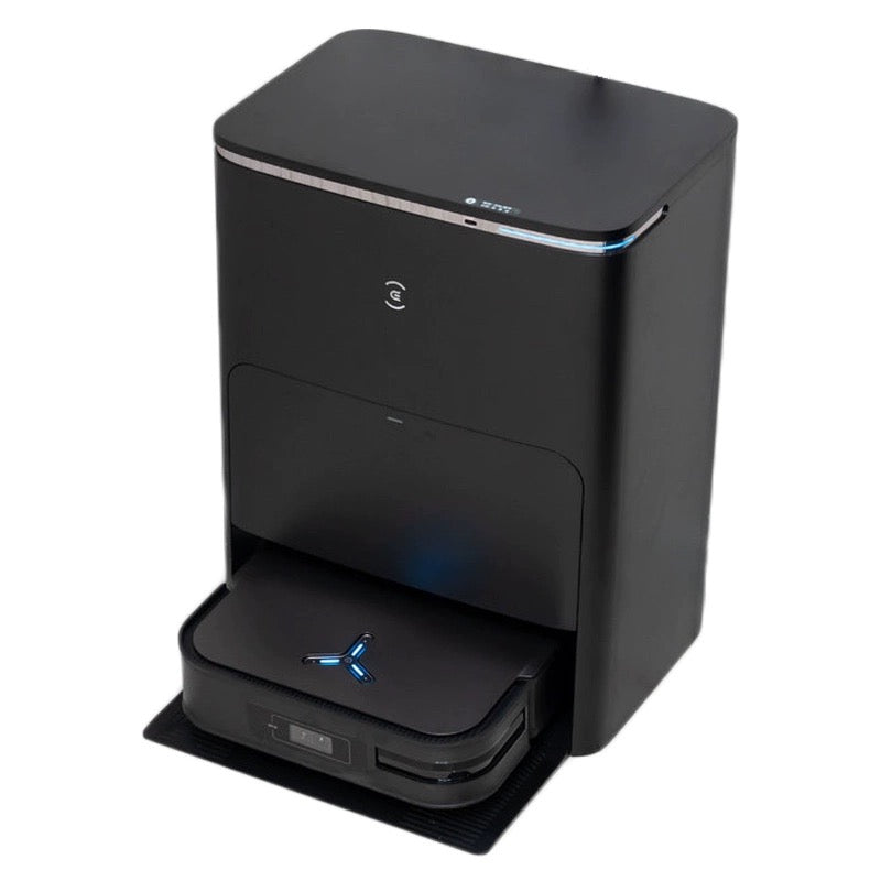 Image of the Ecovacs X5 Pro Omni, a sleek, black robot vacuum cleaner with its charging and cleaning base. The robot is docked in the station, featuring a modern design with a glowing blue indicator light on the front of the robot. The station has a minimalist look, designed for automatic cleaning and maintenance of the robot