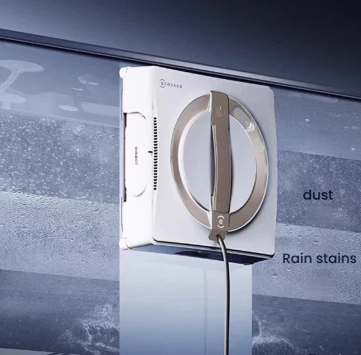 A close-up of the ECOVACS Winbot W2 Pro in action on a glass surface, demonstrating its power to clean away tough grime like dust and rain stains for a streak-free shine.