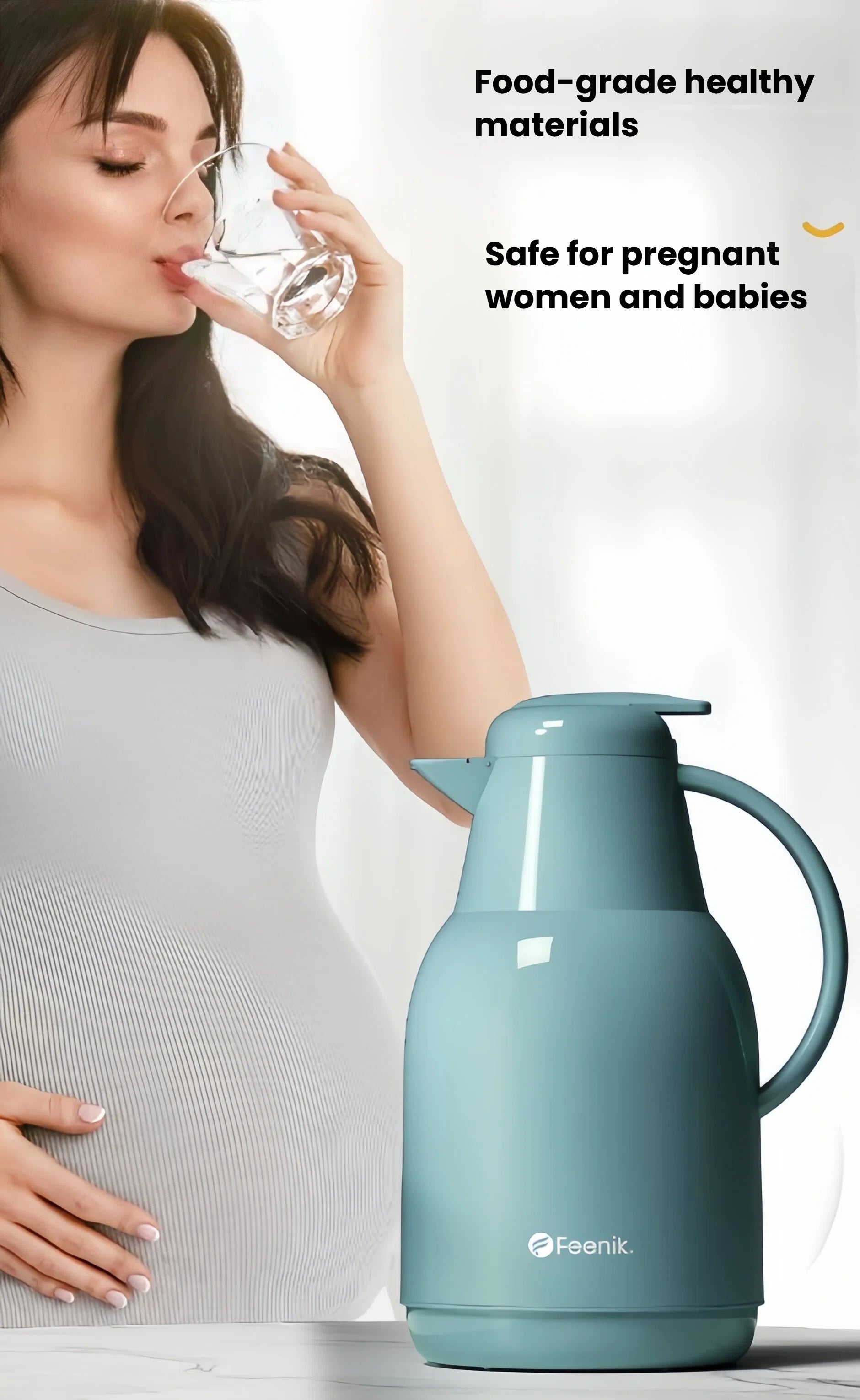 A pregnant woman drinking a glass of water with the blue FEENIK insulated jug in the foreground, emphasizing its food-grade, healthy materials that are safe for the whole family.