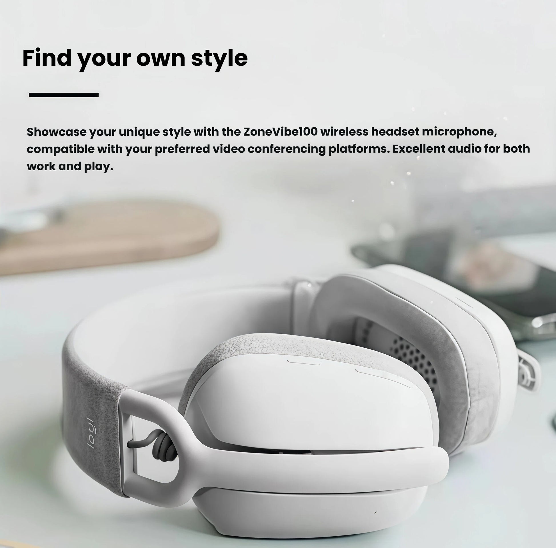 Artistic flat-lay of the off-white Zone Vibe 100 on a minimalist desk, highlighting its sleek silhouette and soft-touch finish for modern workspaces.