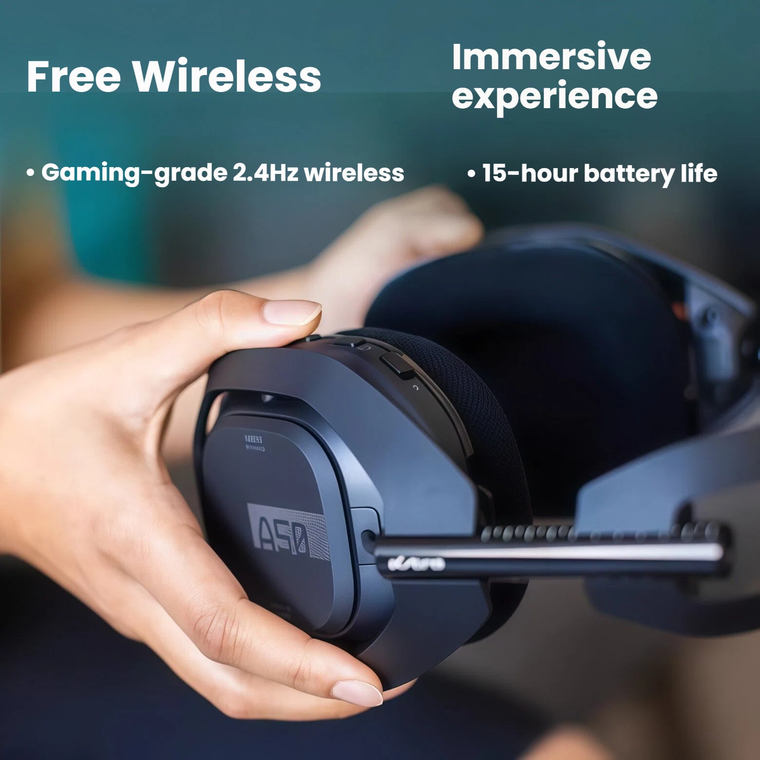 Hands adjusting the black ASTRO A50 X headset, focusing on the ear-cup controls and ASTRO branding.