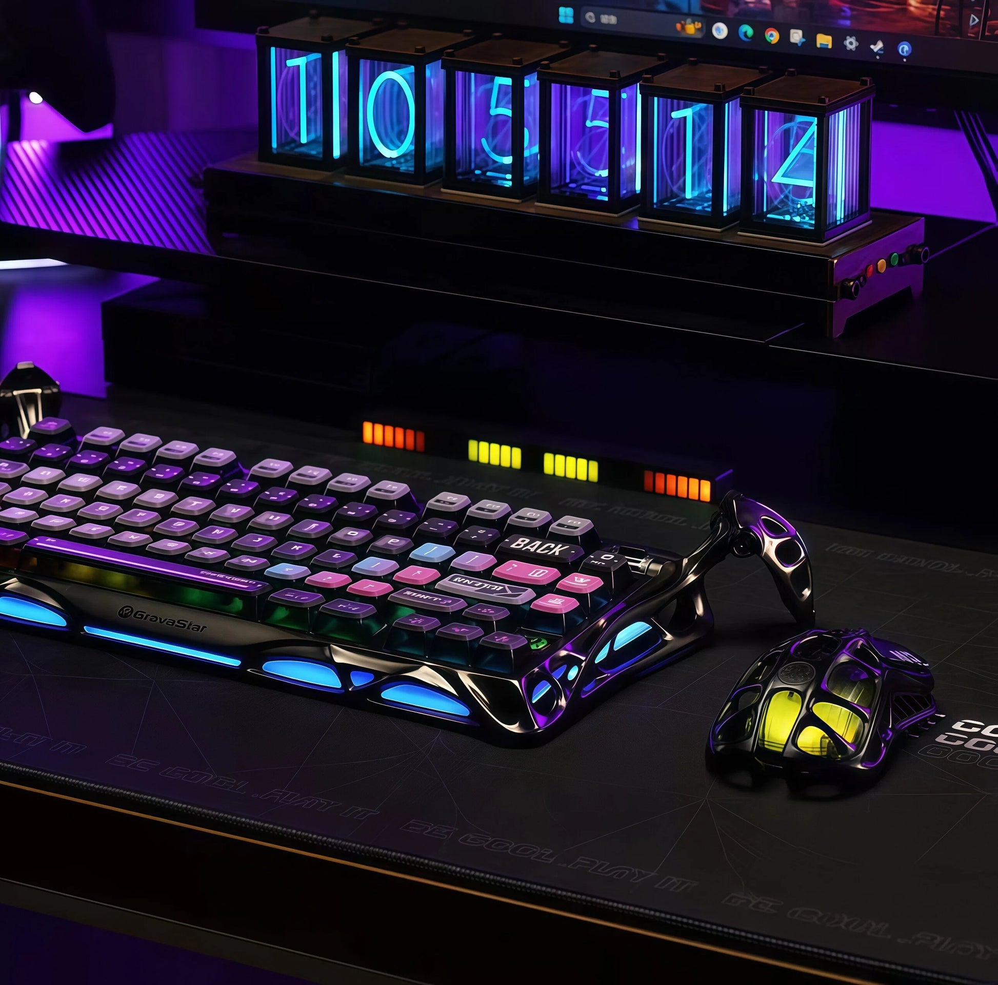 The GravaStar Mercury K1 Lite mechanical keyboard displayed on a premium gaming desk setup with matching RGB mouse and neon clock. The keyboard’s glowing blue and purple lights sync with the ambient lighting, creating a cohesive, high-tech gaming environment ideal for streamers and gamers.