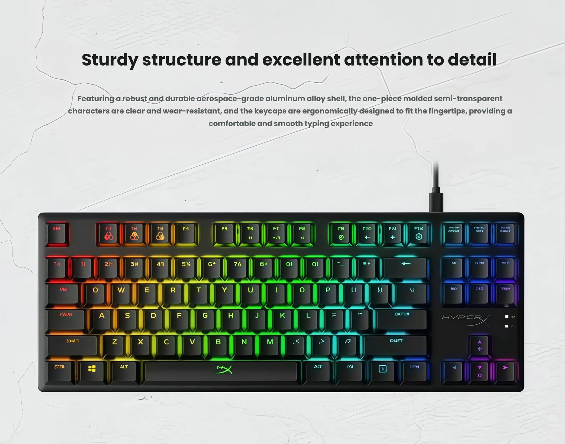 Top view of the HyperX Alloy Origins 60 mechanical gaming keyboard featuring vibrant rainbow RGB backlighting, a compact 60% layout, and an aerospace-grade aluminum alloy chassis. The one-piece semi-transparent keycaps offer clear, wear-resistant legends and ergonomic design for comfortable typing.