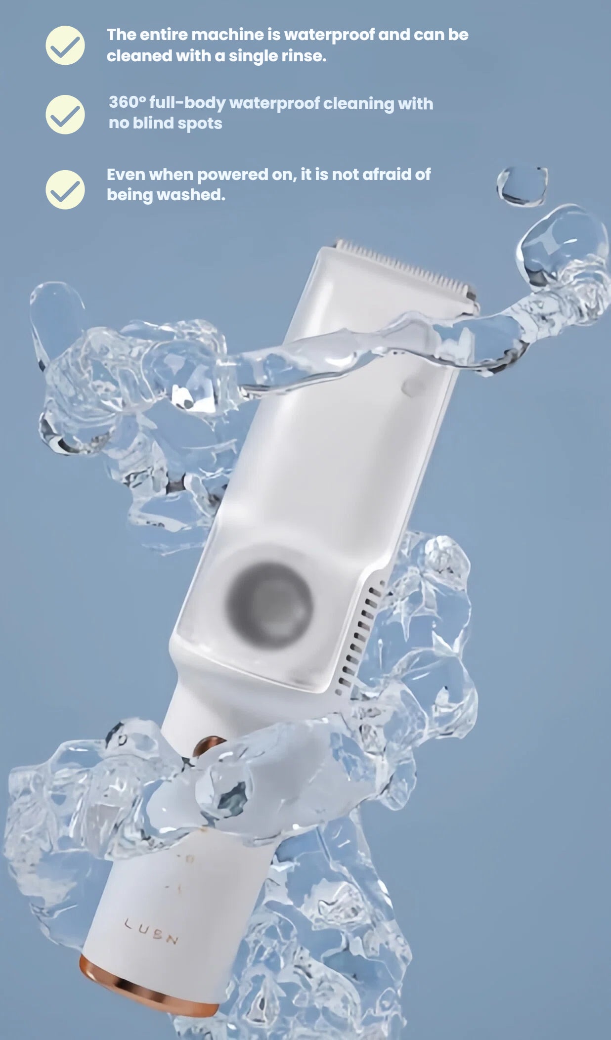 LUSN baby hair clipper being rinsed under water – fully waterproof with IPX7 rating, allowing 360° cleaning even when powered on.