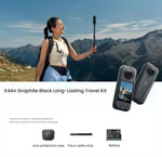  The Insta360 X4 Air Graphite Black Long-Lasting Travel Kit for adventure. The image shows the camera, a protective lens case, a 114cm selfie stick, and an extra battery.