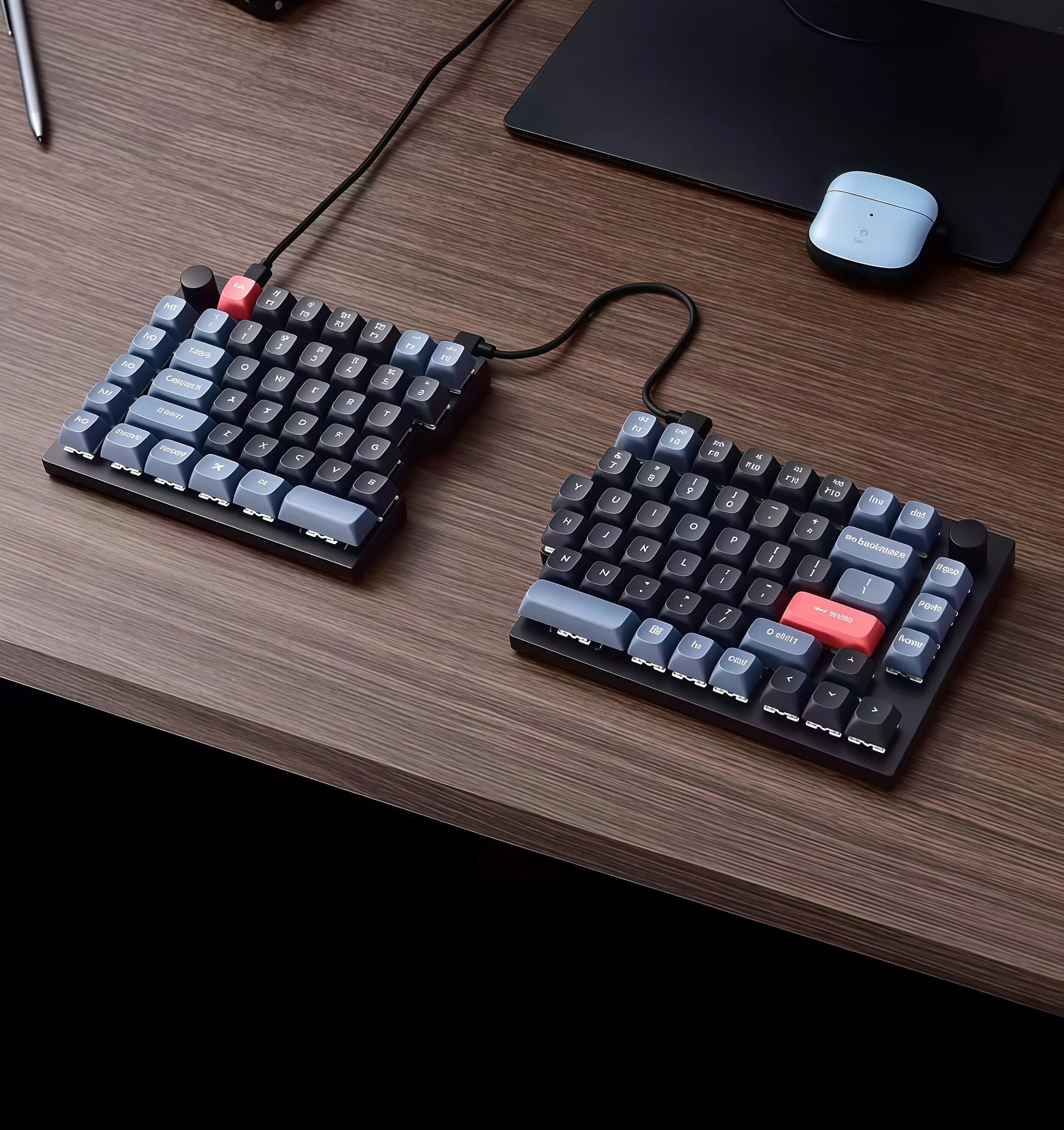 Keychron Q11 split mechanical keyboard on a wooden desk with wireless mouse and laptop, demonstrating ergonomic typing setup ideal for home office or professional workspace.