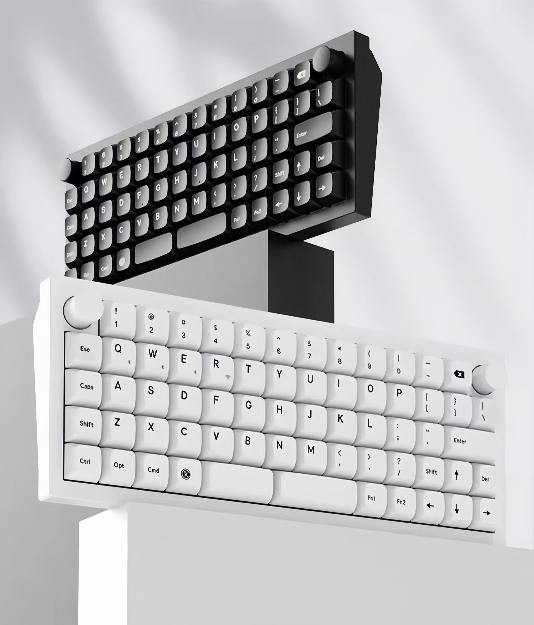 Stylized display of two Keychron Q15 Max keyboards — one black and one white — stacked vertically to showcase design symmetry, compact size, and dual-color options for personalized style.
