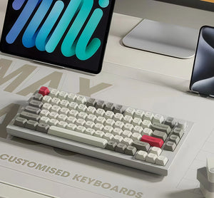 Keychron Q1 Max wireless mechanical keyboard with white and gray OSA PBT keycaps, red ESC and Enter keys, placed on a clean modern desk setup with tablet and laptop, ideal for compact workspaces and productivity.