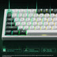 Front-facing shot of Keychron Q5 HE keyboard with glowing RGB underlighting and sensor lines, highlighting low power consumption, stable touch response, and real-time calibration technology.