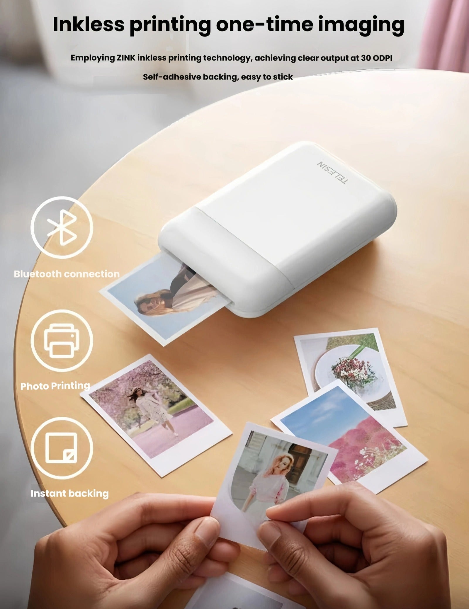 Liene x TELESIN portable photo printer on wooden table printing 2x3" ZINK photos. Features include Bluetooth connection, inkless printing at 30 ODPi, and self-adhesive backing for easy sticking to journals or gifts.