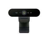 Front-facing shot of the black Logitech BRIO 4K webcam, highlighting its 4K lens, dual microphones, and Windows Hello-ready infrared sensors.