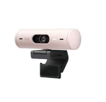 Front shot of the rose-colored Logitech Brio 500 webcam, emphasizing its modern design, 1080p resolution, and eco-conscious build.