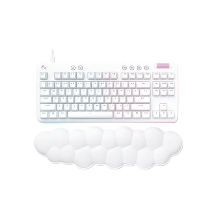 Top-down view of the white Logitech G713 wired tenkeyless mechanical keyboard from the Aurora Collection, paired with its signature fluffy cloud wrist rest and soft RGB underglow.