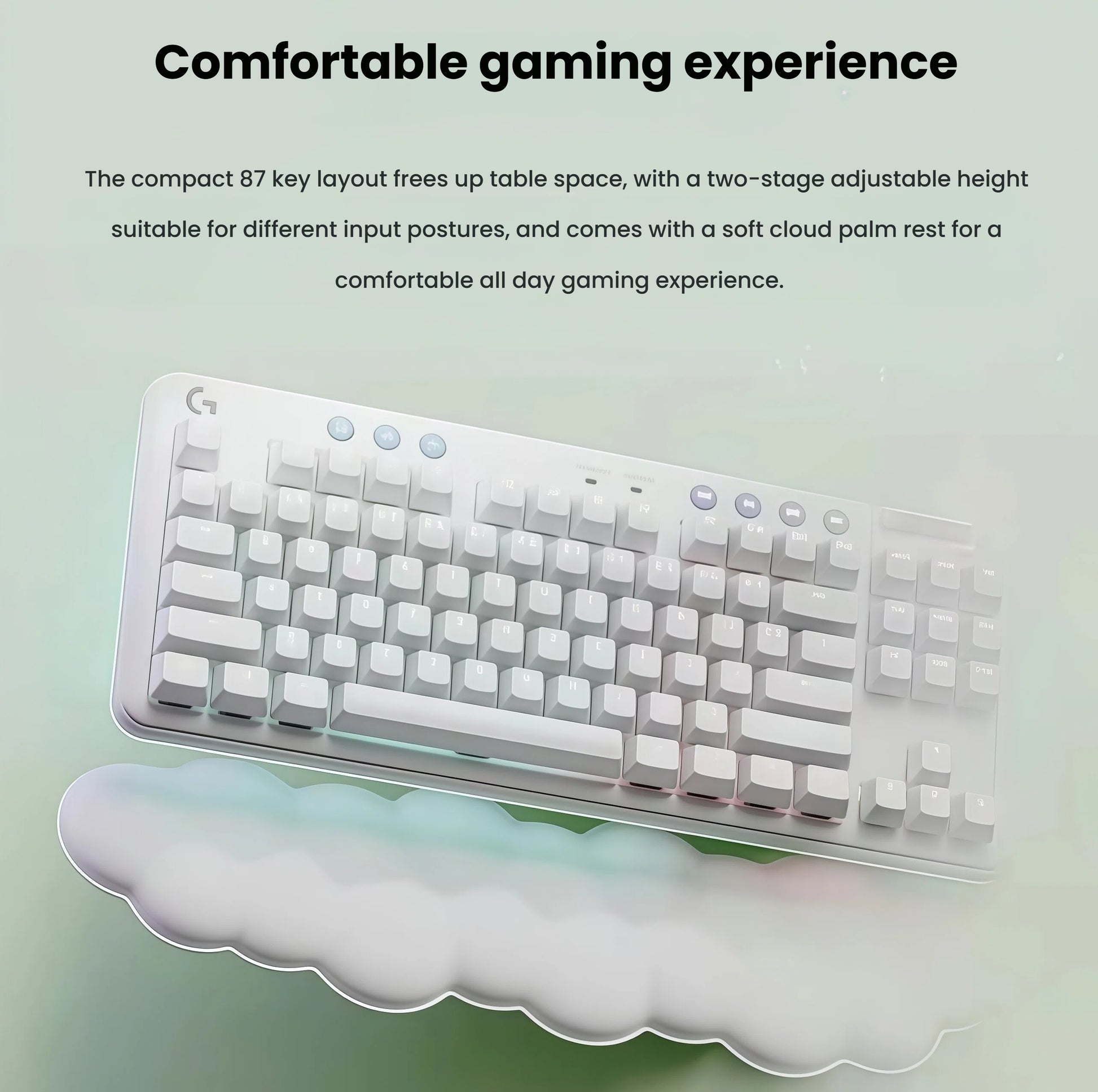 Lifestyle image of the white G715 keyboard on a mint-green surface, illustrating the compact 87-key layout, two-stage adjustable feet, and plush cloud wrist rest for all-day comfort.