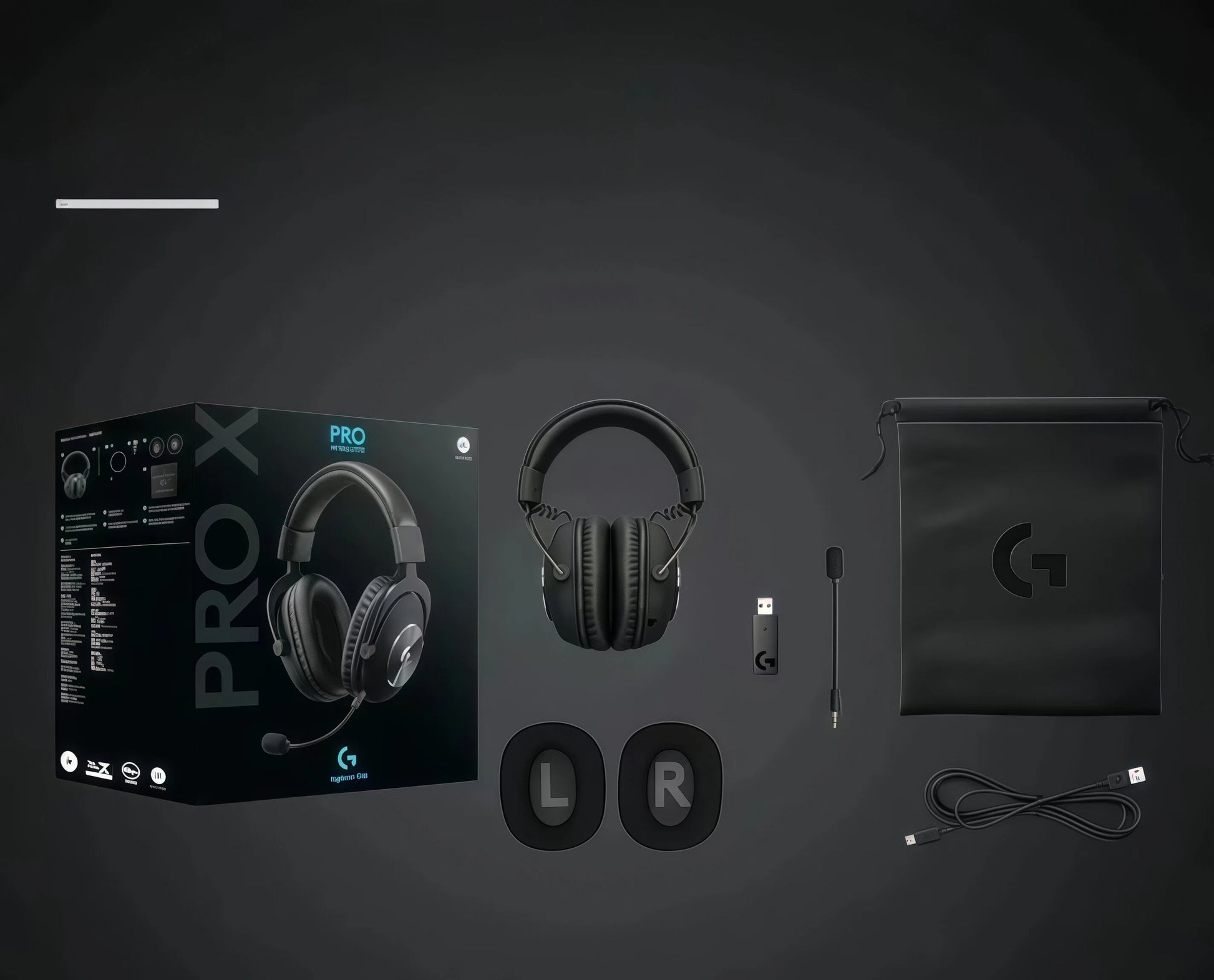Overhead shot of the PRO X 2 retail box and all included items: headset, LIGHTSPEED dongle, detachable mic, extra velour ear pads, USB-C cable, and carrying pouch.