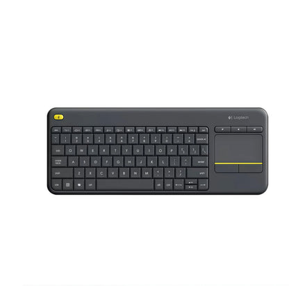Top-down shot of the black Logitech K400 Plus wireless keyboard with integrated touchpad, highlighting its compact layout and left-side volume controls.