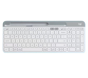 Clean overhead view of the off-white Logitech K580 wireless keyboard, highlighting its ultra-thin profile, integrated device slot, and quiet low-profile keys.